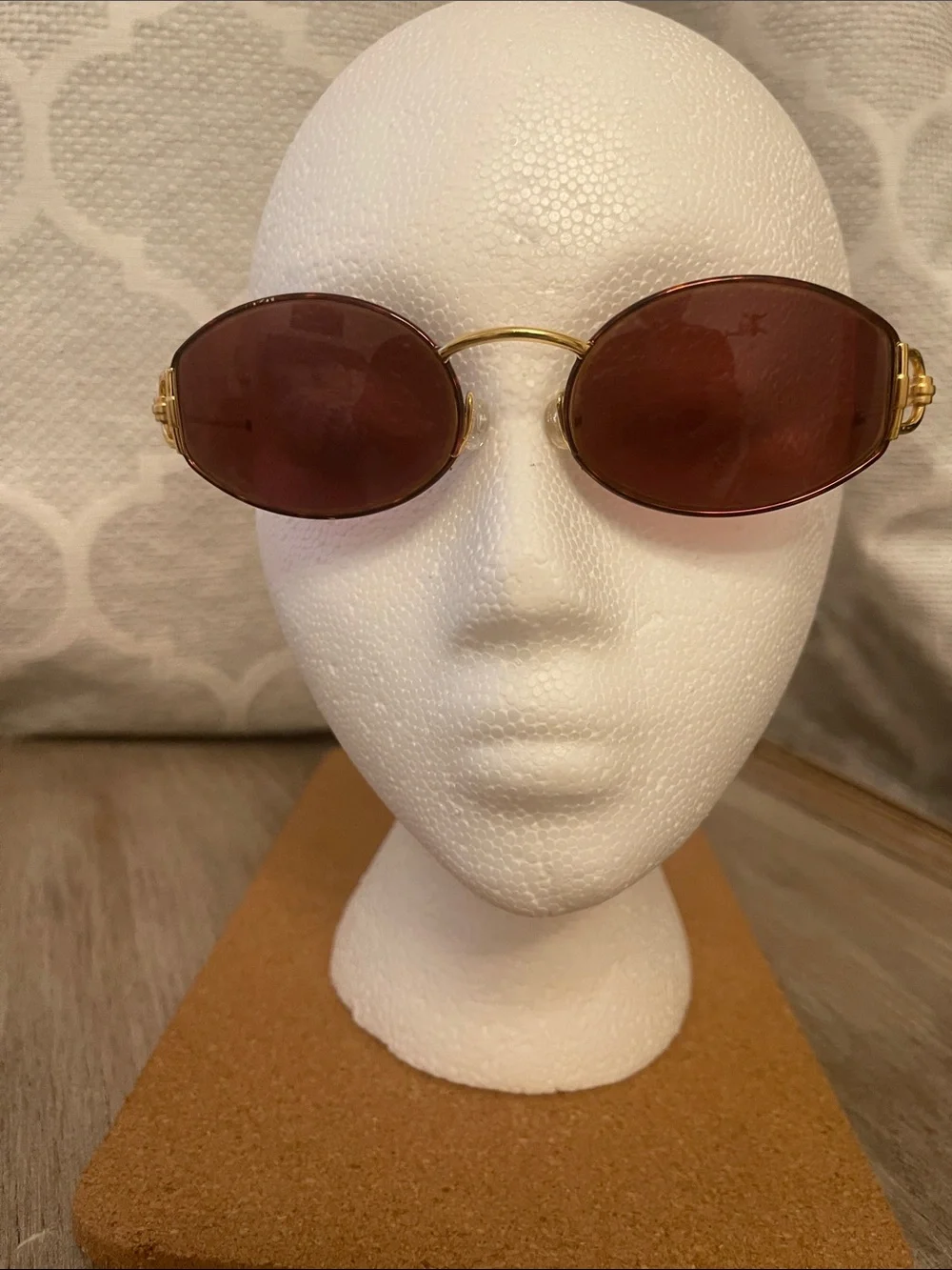 Gucci Oval Gold Frame Sunglasses with Brown Lenses